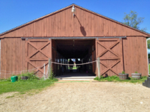 Photo of exterior of boarding stables at Amethyst Farm